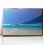 Art deco poster of Caribbean Antigua scenery with vibrant blue and green hues on a gold-framed acrylic.