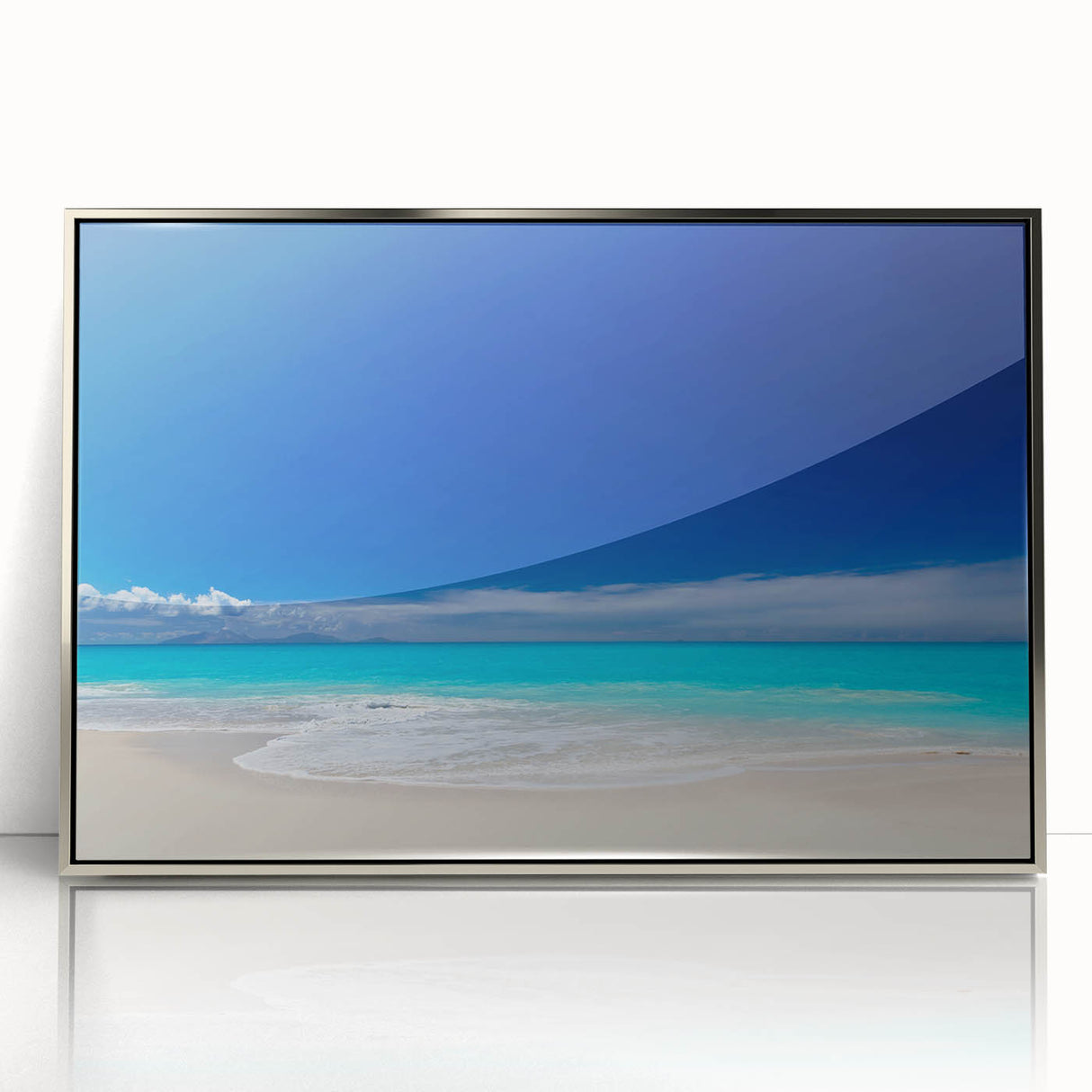 Large art print of a Caribbean beach scene in muted blue and beige tones on a framed acrylic.