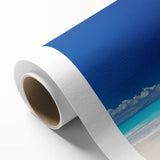 Art deco poster of Caribbean Antigua scenery on rolled canvas, featuring serene blue and green tones.