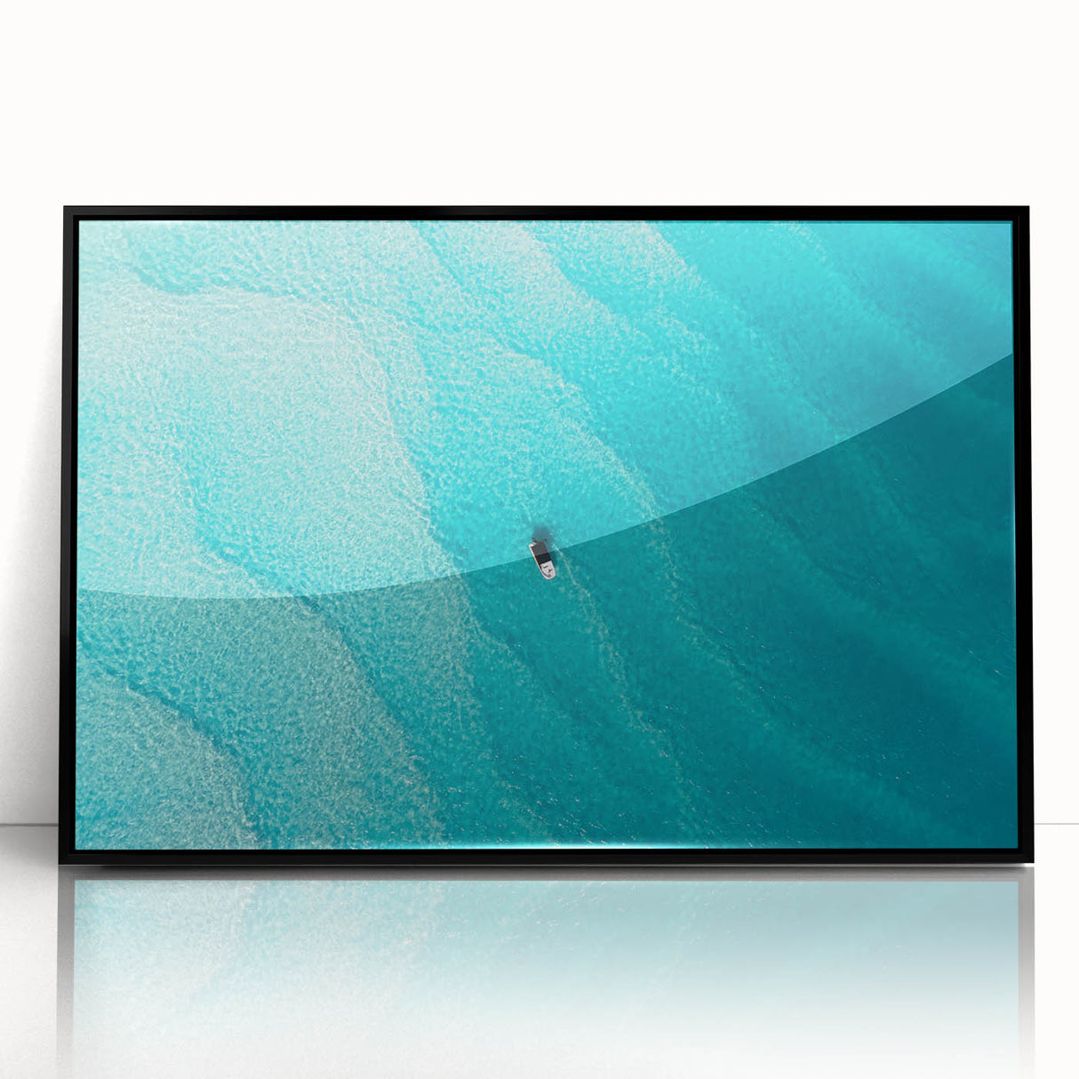 Large abstract wall art featuring a Caribbean beach scene in muted blues and greens, framed in black acrylic.