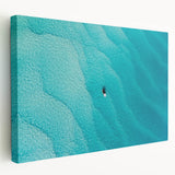 Large art of a Caribbean beach scene on stretched canvas, featuring turquoise waters and sandy shores.