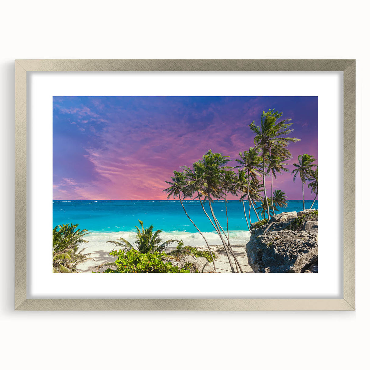 Extra large abstract art print of Caribbean scenery in muted blues and greens, framed in silver, ideal for living room decor.