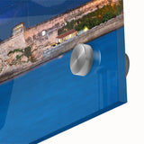 Large abstract wall art depicting a Caribbean scenery in muted blues and greens on acrylic glass, ideal for dining room art.