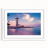 Textured abstract art print depicting a Caribbean scenery in muted blue and green, framed with a white mat.