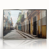 Art deco poster depicting a Caribbean scenery in vibrant blue and green tones on a silver-framed acrylic print.