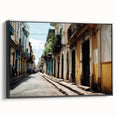 Black and white wall art featuring a vintage poster-style landscape of the Caribbean on framed canvas.