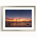 Extra large abstract art print of Caribbean scenery in muted blue and green tones, framed in silver.