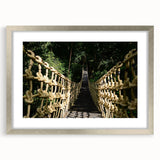 Textured abstract art print of a Central American scenery in muted earth tones, framed in silver, ideal for bedroom art.