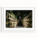 Abstract art print featuring a stylized Belize scenery in cool blue and green hues, framed with a white mat.