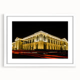 Abstract art print depicting a vibrant, colorful Central American landscape on a framed white mat.