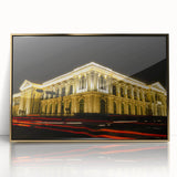 Mid-century modernist art print of a Central American landscape in muted earth tones, framed in gold acrylic.