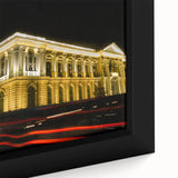 Textured black wall art featuring a vibrant, colorful Central American scenery on a framed canvas.