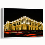 Vintage poster art of a Central American scenery on a large framed canvas, featuring vivid colors against a black background.