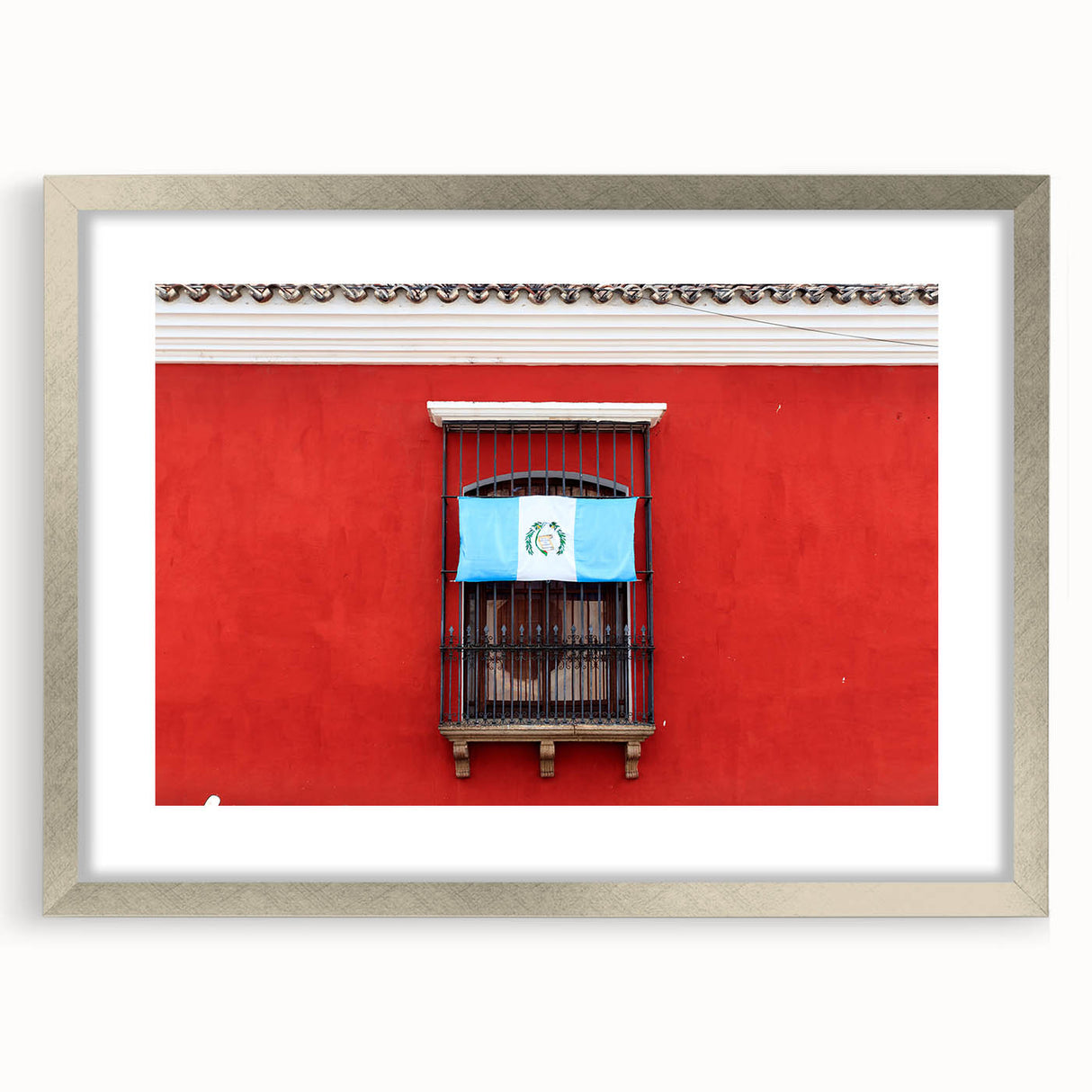 Textured abstract art print of a Central American landscape in muted earth tones on a framed silver mat.