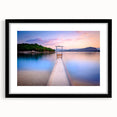Extra large abstract art print of a colorful European scenery on textured canvas, framed in black.