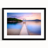 Extra large abstract art print of a colorful European scenery on textured canvas, framed in black.