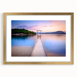 Abstract art print of a European scenery in muted earth tones, framed with a gold mat, ideal for dining room decor.