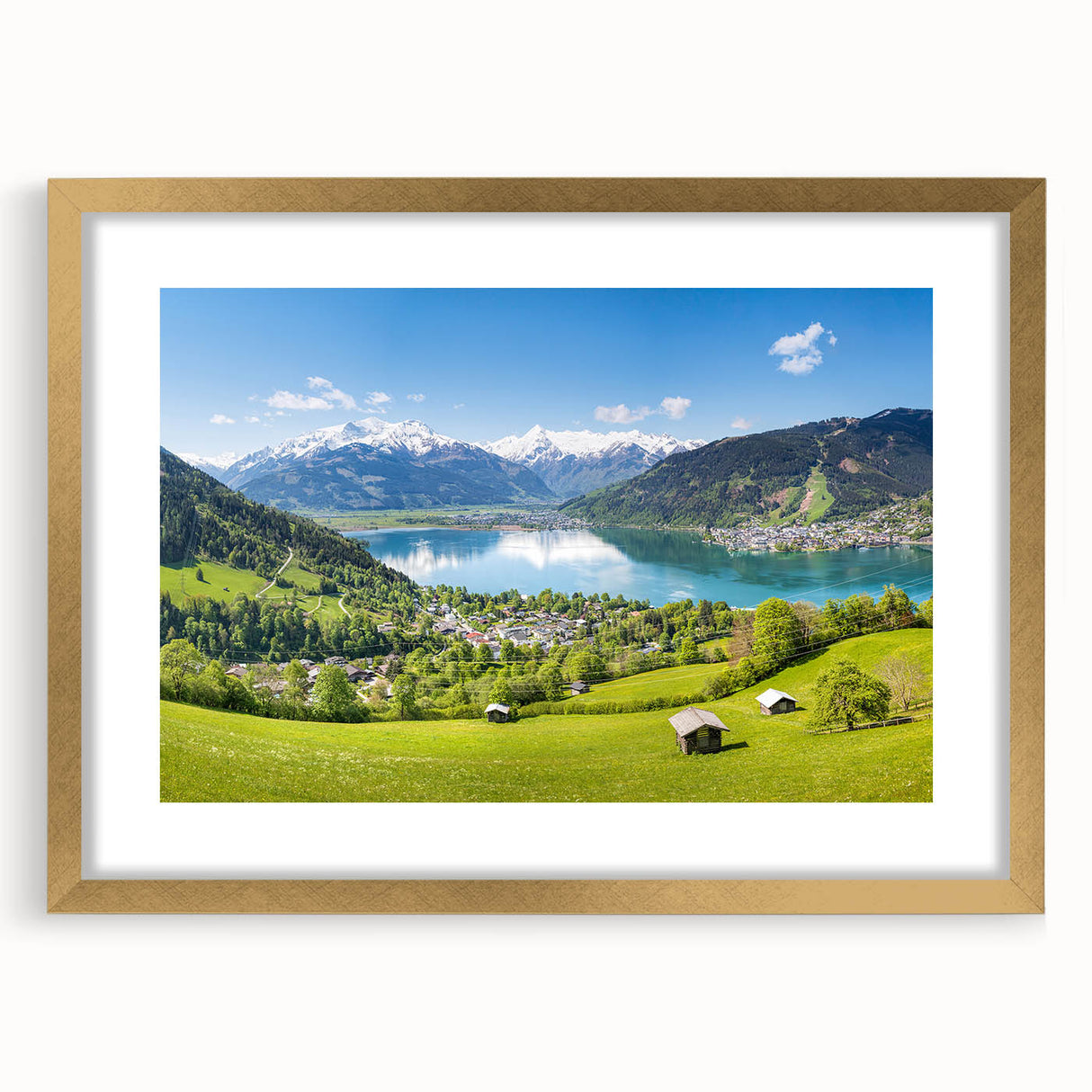 Abstract art print of a European landscape in muted earth tones on a framed canvas.