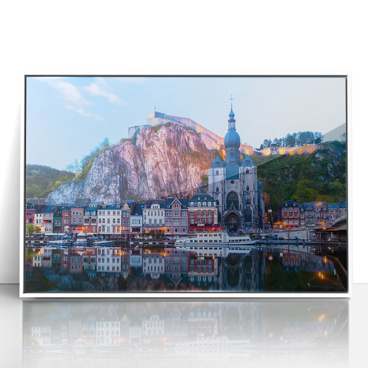 Mid-century modernist art depicting a serene European landscape in muted green and blue tones, acrylic print framed in white.
