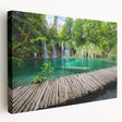 Large art depicting a Croatian coastal scene in muted blue and green tones on stretched canvas, suited for kitchen wall art.