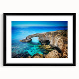 Extra large abstract art print of a colorful European scenery on textured canvas, framed in black.