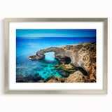 Extra large wall art print depicting an abstract European scenery in textured gray and blue tones, framed in silver.