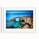 Textured art print of abstract European scenery in muted earth tones, framed in white, ideal for bedroom art.