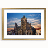 Abstract art print of Prague skyline in muted gold and blue tones on a framed poster, suitable for dining room decor.