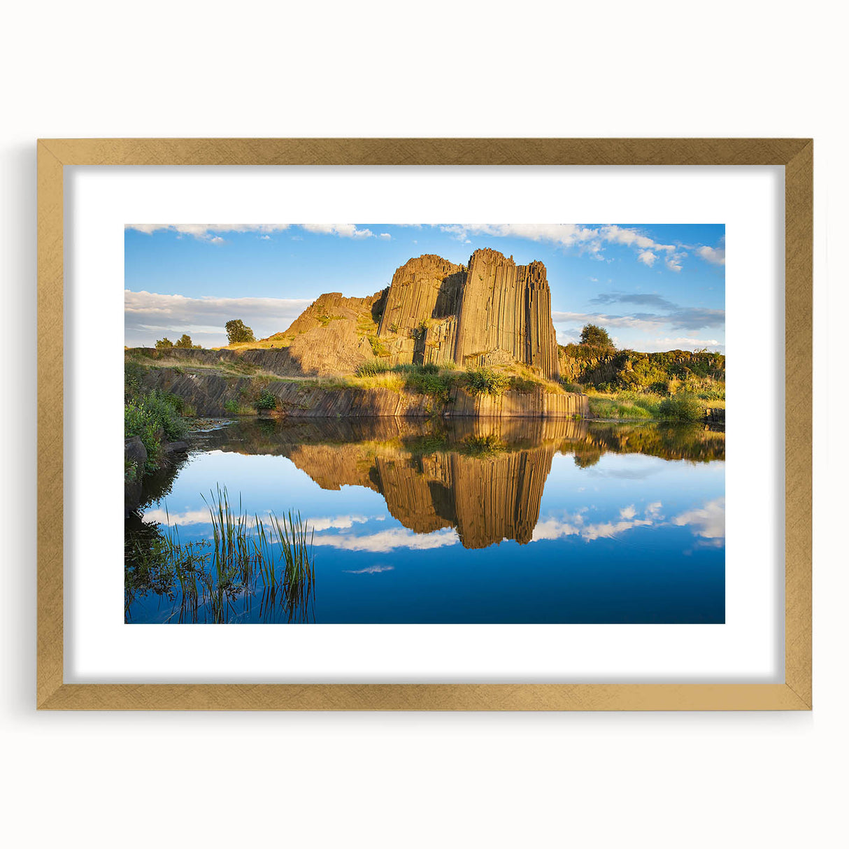 Abstract art print of a Czech Republic scenery in muted earth tones, framed in gold, suitable for dining room decor.