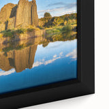 Extra large framed canvas featuring a textured depiction of a European cityscape in black with colorful accents.