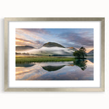 Extra large abstract art print depicting a textured scenery of Cumbria, England, in a silver frame.