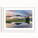 Textured art of abstract Cumbria landscape in muted earth tones on a framed white mat, ideal for bedroom decor.