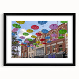 Extra large abstract art print of Piccadilly, England, featuring vibrant colors and a textured design on a framed black mat.