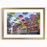 Abstract art print of Piccadilly, England in muted gold and black tones on a framed canvas, suitable for dining room decor.