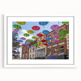 Textured abstract art print of Piccadilly, England in muted earth tones on a framed white mat, suitable for bedroom decor.