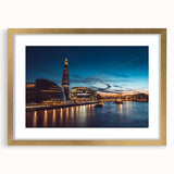 Abstract art print of the Thames River in muted gray and blue tones on a framed canvas, ideal for dining room decor.