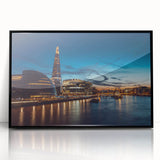 Large abstract wall art of the Thames River, featuring muted grays and blues on a framed acrylic print.