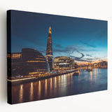 Panoramic view of the Thames River with London landmarks in muted gray and blue tones on stretched canvas.