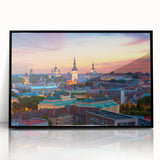 Large abstract wall art depicting a European Estonian scenery in muted gray and blue tones, framed in black acrylic.