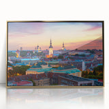 Art deco poster of a European cityscape in pastel shades, framed in gold acrylic, ideal for modern art wall decor.