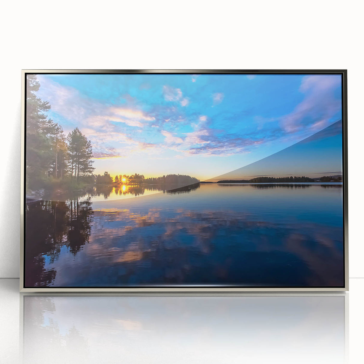 Large art print of a serene Finnish landscape in muted green and blue tones, framed in silver acrylic.
