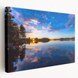 Scenic landscape of a Finnish lake at sunset on stretched canvas, featuring cool blue and gray tones.