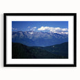 Colorful art print of the French Alps in vibrant hues on a textured, extra large canvas, framed in black.