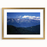 Abstract art print of the French Alps in muted earth tones on a framed canvas, suitable for dining room decor.
