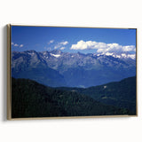 Framed canvas featuring a vintage-style landscape painting of the French Alps in black and gold tones.