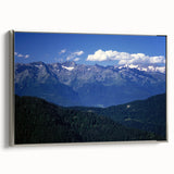 Landscape art painting of the French Alps on a framed canvas, featuring muted earth tones and silver frame.
