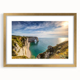 Abstract art print of Normandy, France in muted gray and blue tones, framed in gold, suitable for dining room decor.