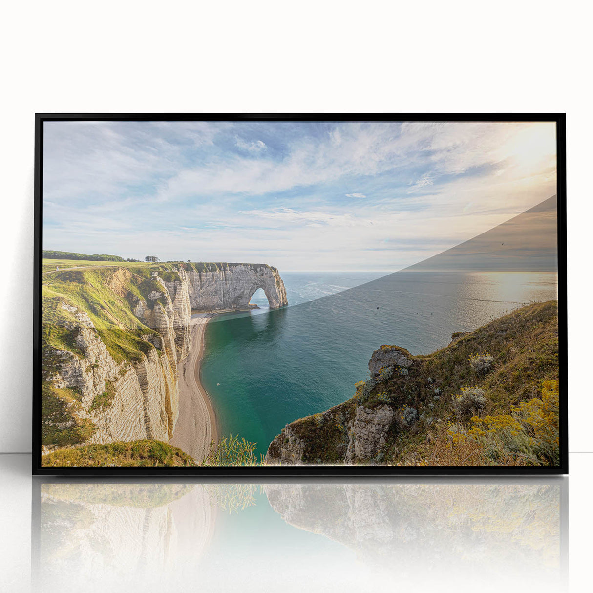 Large abstract wall art depicting a serene Normandy landscape in muted green and blue tones, framed in black acrylic.