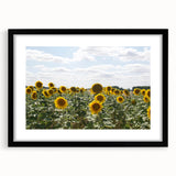 Extra large abstract art print of a colorful, textured European scenery in a black frame, ideal for living room decor.