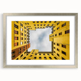 Extra large abstract art print depicting a textured Berlin cityscape in muted gray tones, framed in silver.